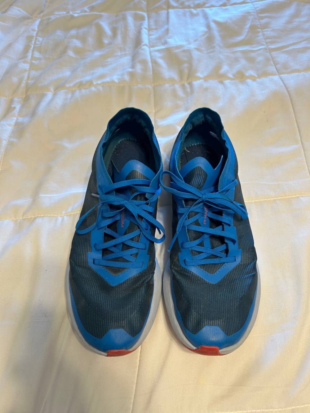 Salomon Men's Athletic Shoes in Blue with Red Accents